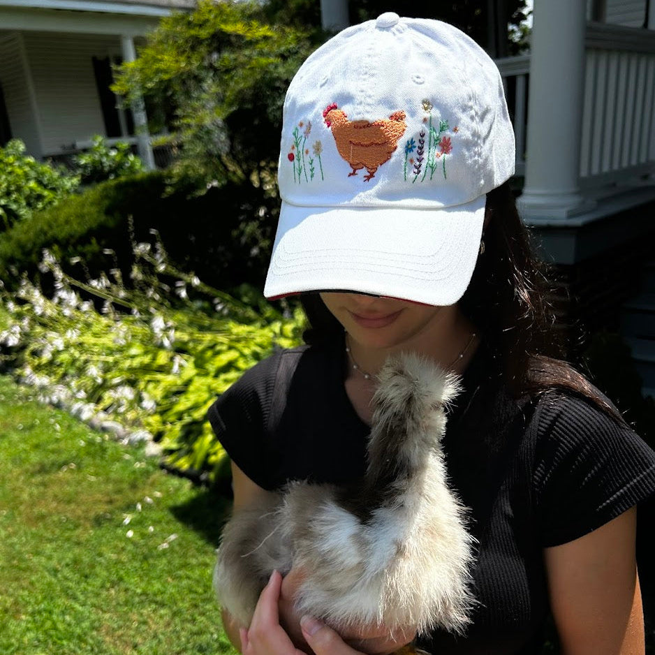 Embroidered hat with adjustable strap